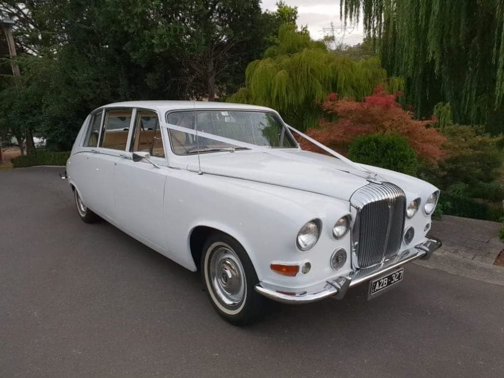 White Classic Jags wedding photo