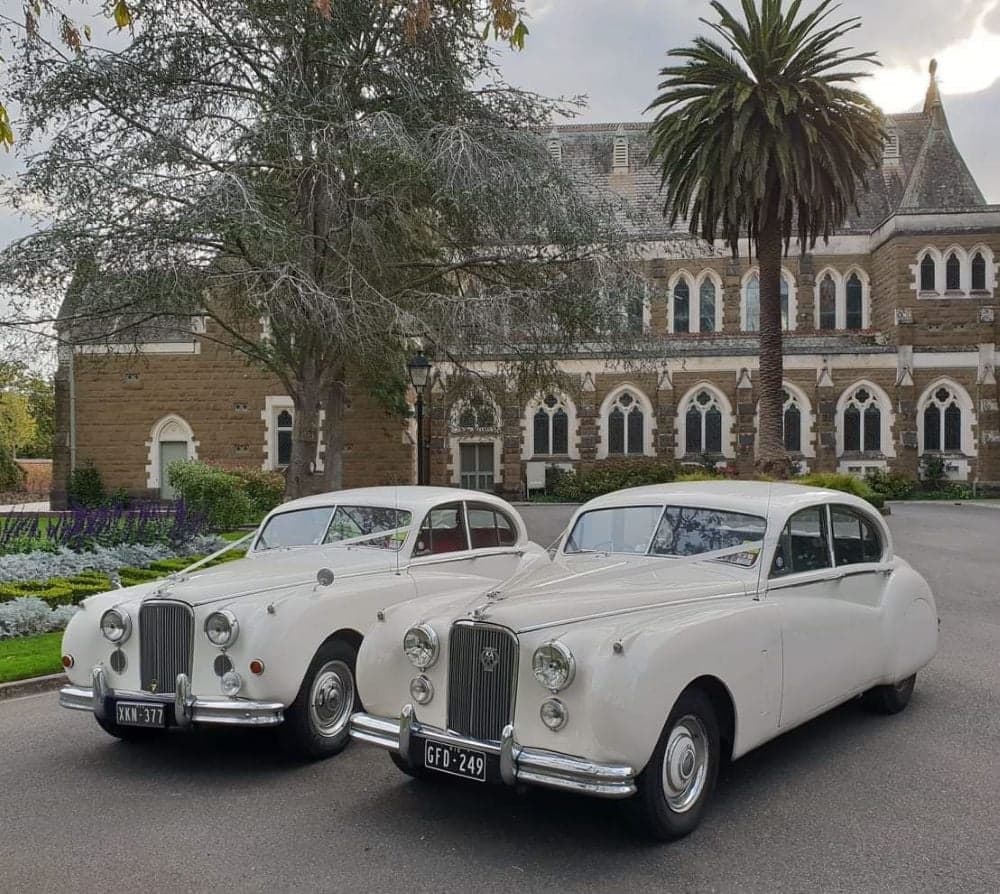 White Classic Jags wedding photo