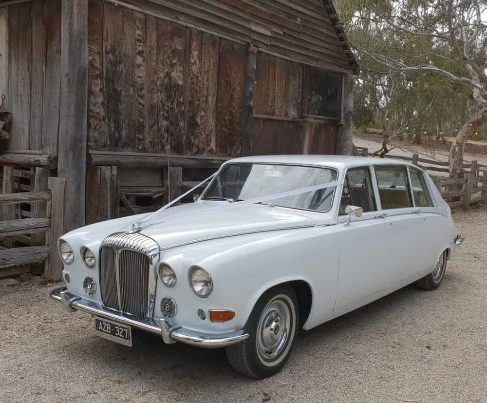 White Classic Jags wedding photo