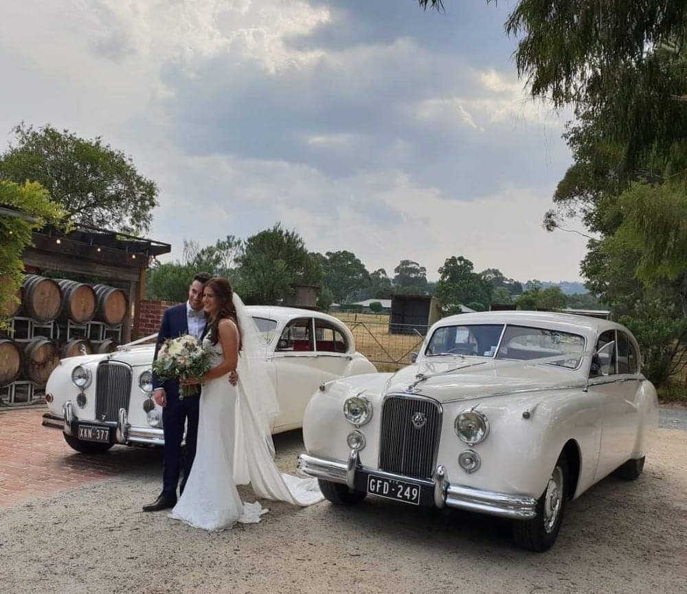 White Classic Jags wedding photo