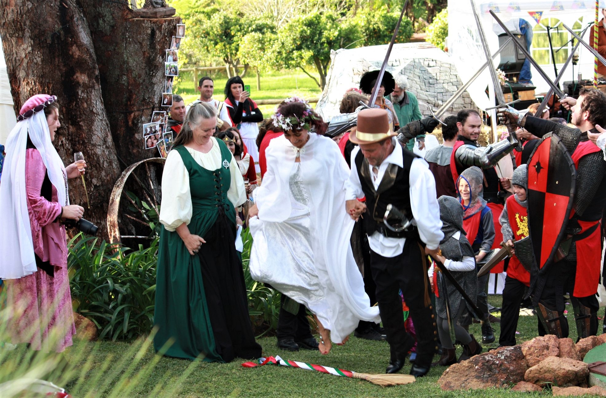 Tamara lampard sword arch and broom jump